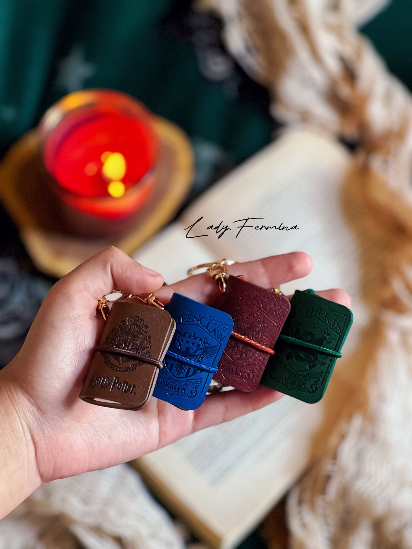 HARRY POTTER HOUSE BOOK KEYCHAINS