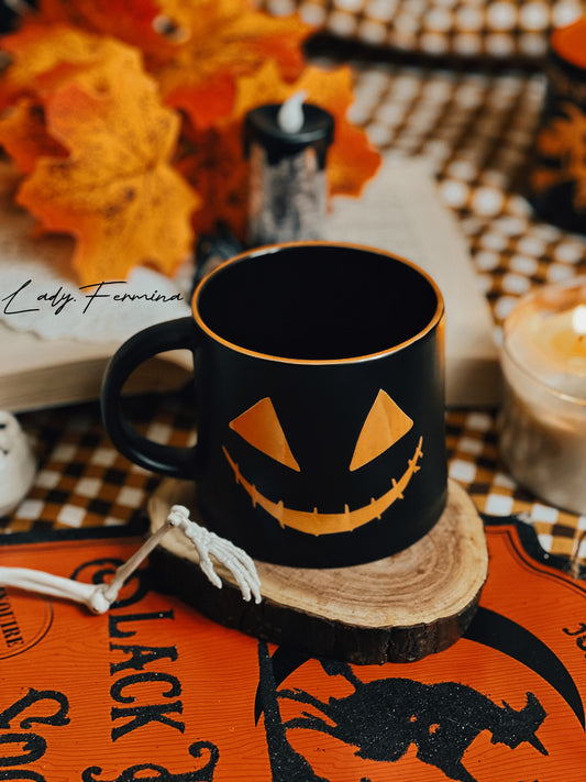 ORANGE EYE BLACK MUG